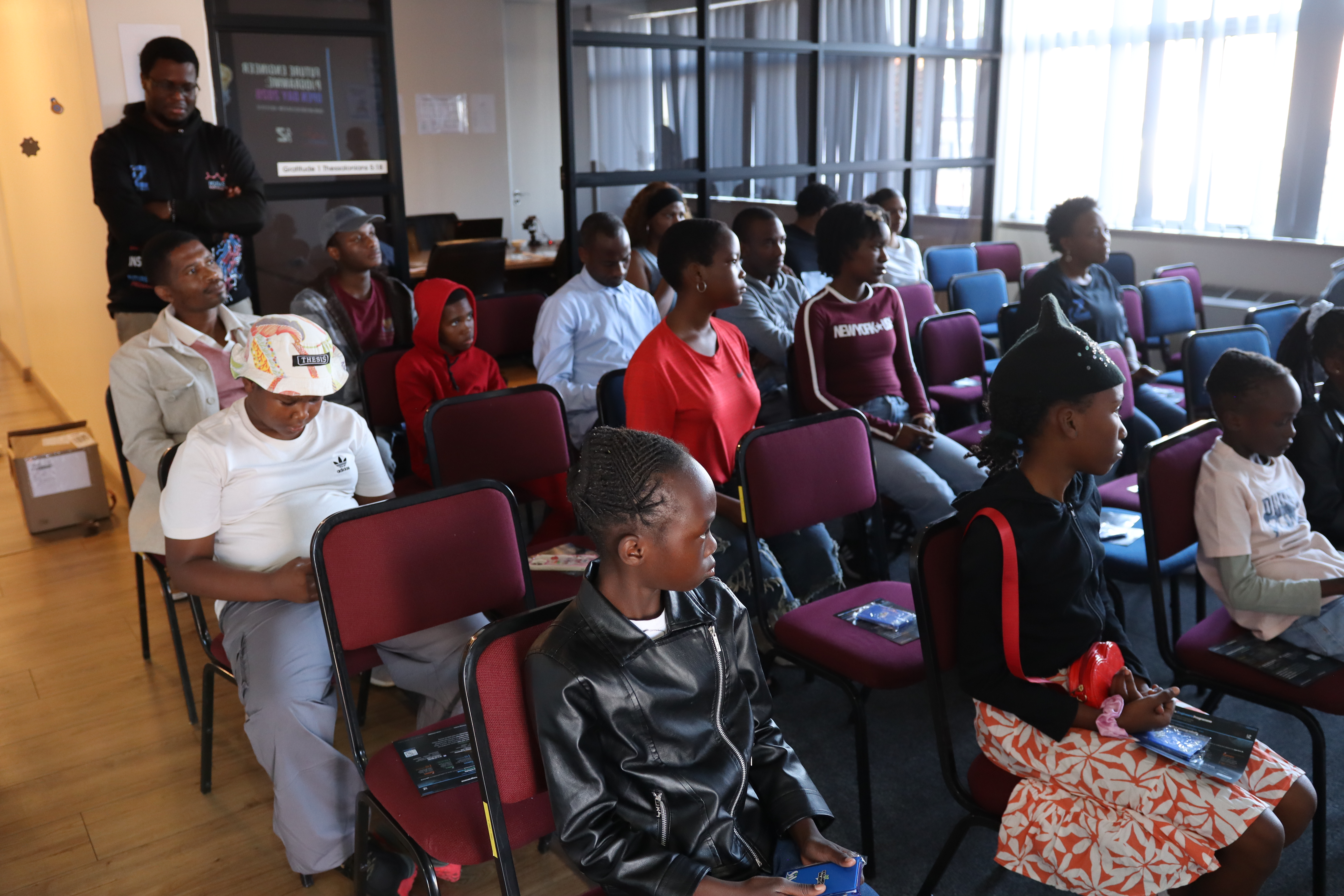 Parents and students attending the presentation